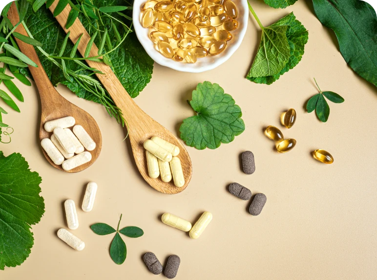 Herbal supplements and capsules on natural background.